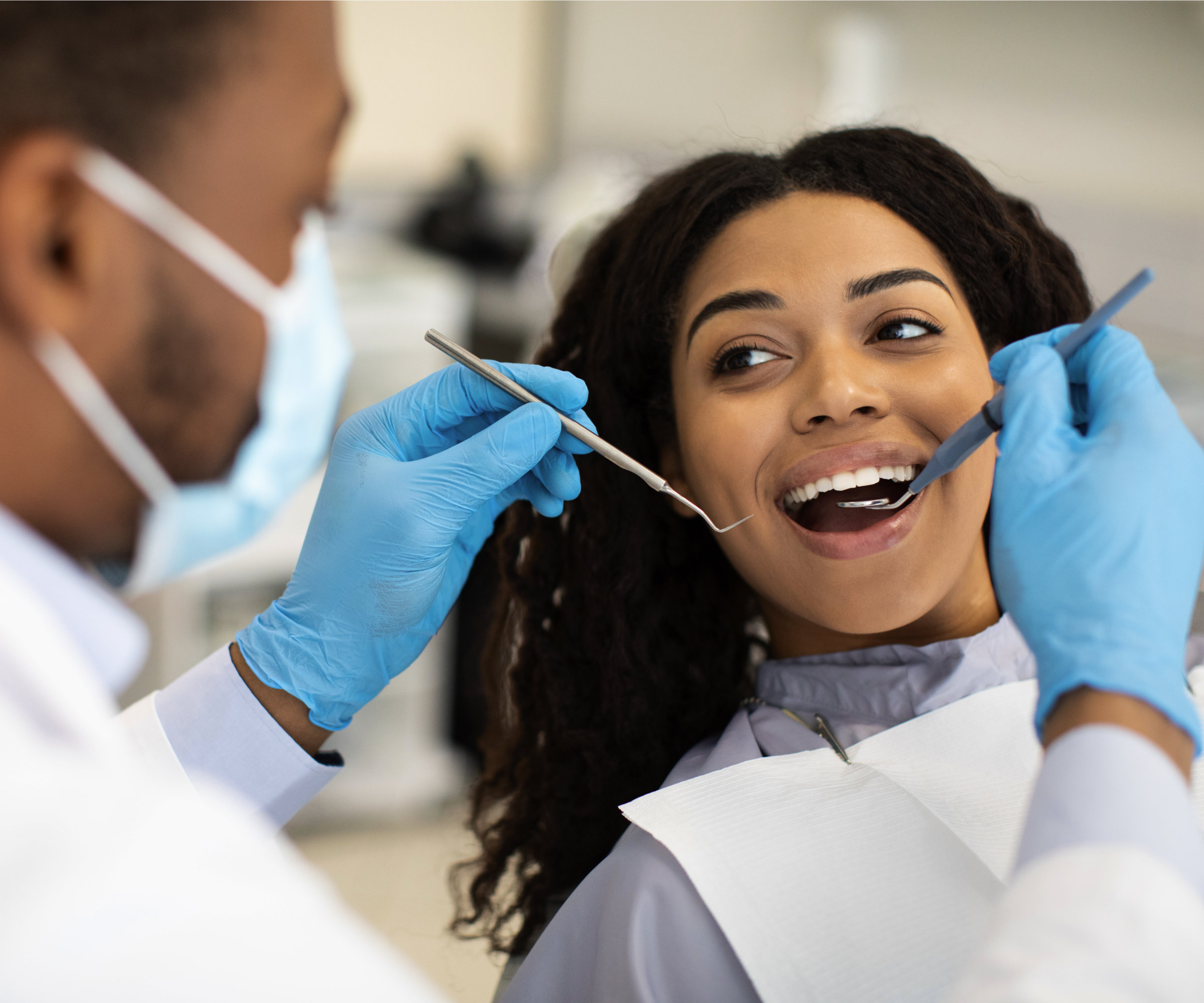 Smiling Natana Dental patient