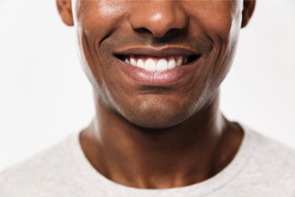 Smiling Natana Dental patient